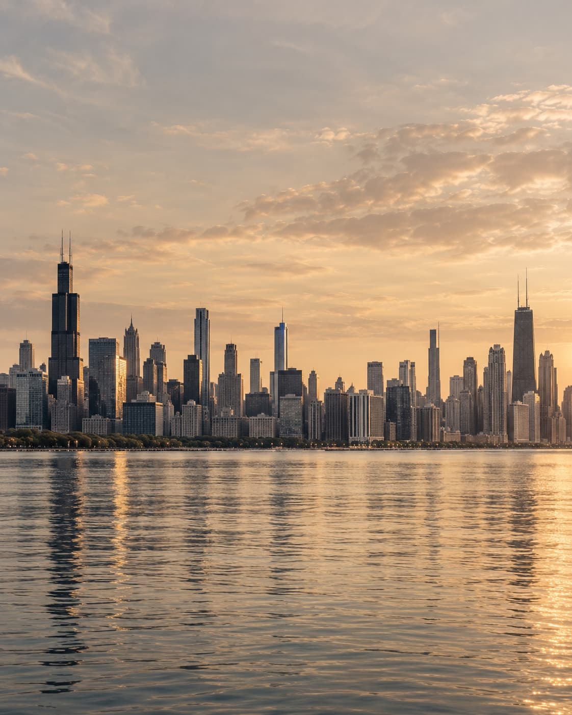 Chicago skyline above Lake Michigan in warm bronze and charcoal tones